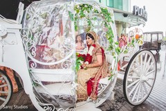 Capture of Indian bride riding the wedding carriage Capture of Indian bride riding the wedding carriage