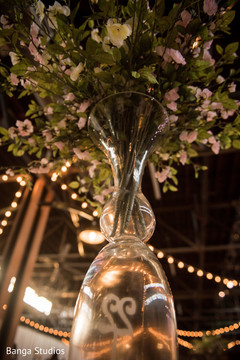 Indian wedding floral and crystals table centerpiece. Indian wedding floral and crystals table centerpiece.