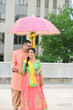 Indian bride and groom on their marvelous sangeet outfits. Indian bride and groom on their marvelous sangeet outfits.