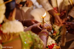 Indian couple lighting out the sacred fire. Indian couple lighting out the sacred fire.