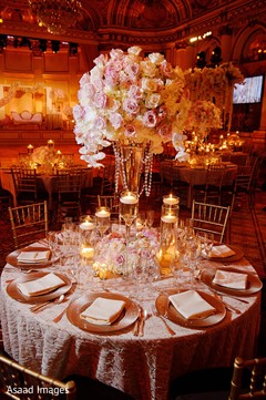Dreamy Indian wedding reception table flowers and decoration. Dreamy Indian wedding reception table flowers and decoration.