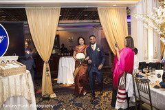 Ravishing Indian bride and groom entrance to wedding reception. Ravishing Indian bride and groom entrance to wedding reception.