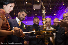 Maharani and raja lighting up the fire. Maharani and raja lighting up the fire.