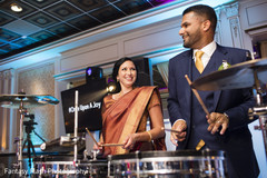 Indian bride and groom performing at reception capture. Indian bride and groom performing at reception capture.