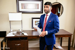 Enchanting groom getting ready for wedding ceremony. Enchanting groom getting ready for wedding ceremony.