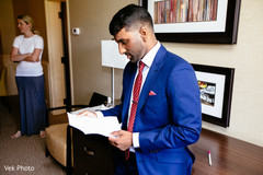 Charming Indian groom looking out the wedding vows. Charming Indian groom looking out the wedding vows.