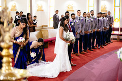 Stunning Indian lovebirds with groomsmen at ceremony capture. Stunning Indian lovebirds with groomsmen at ceremony capture.