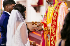 Indian bride being blessed by priest. Indian bride being blessed by priest.