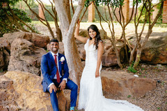 Lovely Indian bride and groom looking at camera. Lovely Indian bride and groom looking at camera.