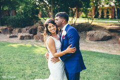 Lovely Indian groom kissing bride photo session. Lovely Indian groom kissing bride photo session.