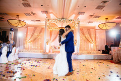 Lovely Indian couple enjoying their first dance capture. Lovely Indian couple enjoying their first dance capture.