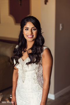 Joyful Indian bride with her makeup done capture. Joyful Indian bride with her makeup done capture.