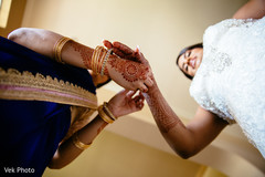 Marvelous Indian bridal getting her brazaletes on. Marvelous Indian bridal getting her brazaletes on.
