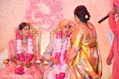 Indian bride and groom during a moment of the rituals Indian bride and groom during a moment of the rituals