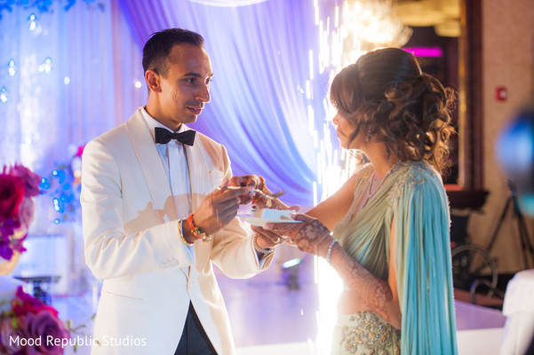 Tender moment between the Indian newlyweds