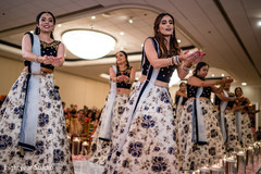 Beautiful bridesmaids performing a choreography at the reception Beautiful bridesmaids performing a choreography at the reception
