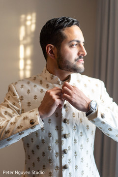 Elegant Indian groom getting ready for the ceremony Elegant Indian groom getting ready for the ceremony