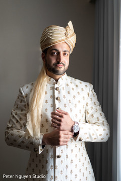 Details of the elegant Indian groom's attire Details of the elegant Indian groom's attire
