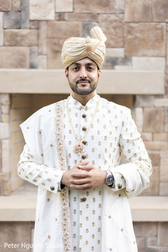 Indian groom awaits to meet the maharani prior to the ceremony Indian groom awaits to meet the maharani prior to the ceremony