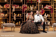 Elegant Indian bride and groom posing for pictures Elegant Indian bride and groom posing for pictures