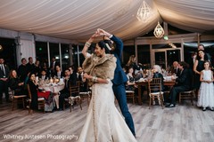 Indian newlyweds enjoying their first dance at the reception venue Indian newlyweds enjoying their first dance at the reception venue