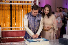 Indian parents cutting out cake at sangeet. Indian parents cutting out cake at sangeet.