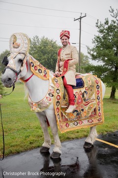 Gorgeous Indian groom on a white baraat horse capture. Gorgeous Indian groom on a white baraat horse capture.