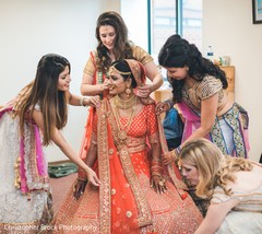 Indian bridesmaids helping Indian bride. Indian bridesmaids helping Indian bride.