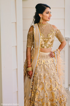 Stunning Indian bride on her wedding reception outfit. Stunning Indian bride on her wedding reception outfit.