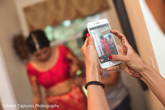 Fun capture of Indian bride getting ready. Fun capture of Indian bride getting ready.