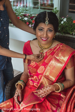 Dazzling indian bride getting ready. Dazzling indian bride getting ready.
