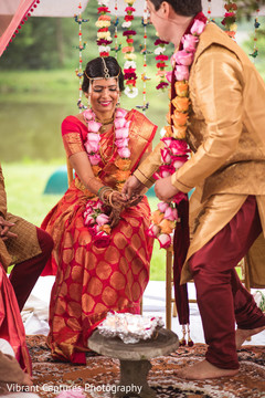 Lovely Indian couple during wedding ritual. Lovely Indian couple during wedding ritual.
