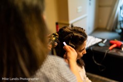 Indian bride getting her hair ready for her ceremony. Indian bride getting her hair ready for her ceremony.