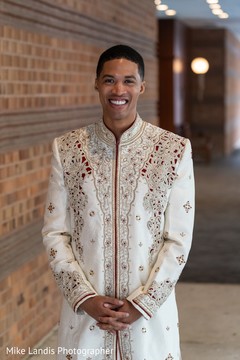Charming Indian groom looking at camera. Charming Indian groom looking at camera.