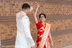 Enchanting Indian bride and groom's first look capture. Enchanting Indian bride and groom's first look capture.