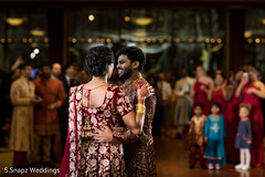 Indian bride and groom dancing at the reception Indian bride and groom dancing at the reception