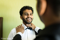 Indian groom getting ready for the ceremony Indian groom getting ready for the ceremony