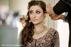 Lovely Indian bride getting her hair done. Lovely Indian bride getting her hair done.