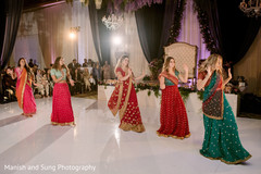 Indian bridesmaids dancing on their wedding reception party. Indian bridesmaids dancing on their wedding reception party.
