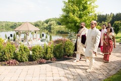 Indian groom and family making their entrance Indian groom and family making their entrance