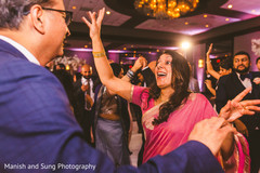 Joyful Indian guests dancing at the reception Joyful Indian guests dancing at the reception