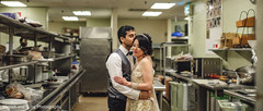 Indian couple taking pictures at the kitchen Indian couple taking pictures at the kitchen