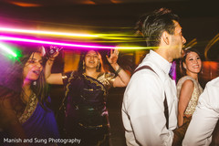 Indian wedding guests and couple at the party Indian wedding guests and couple at the party