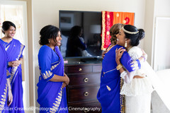 Indian bride with bridesmaids prior to the ceremony Indian bride with bridesmaids prior to the ceremony