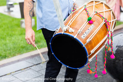 Capture of the dhol player outdoors during baraat Capture of the dhol player outdoors during baraat