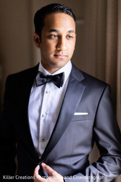 Elegant Indian groom getting ready for the reception Elegant Indian groom getting ready for the reception