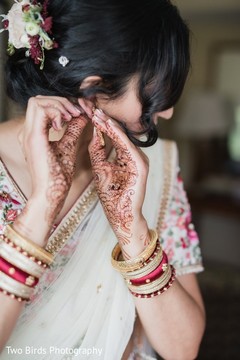 Indian bride showing her mehndi design Indian bride showing her mehndi design