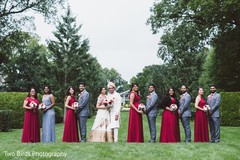 Indian newlyweds posing for pictures outdoors Indian newlyweds posing for pictures outdoors