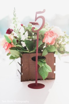 Table identification and floral arrangement Table identification and floral arrangement