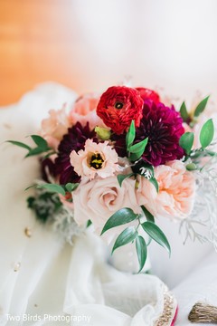 Floral arrangement on the bridal accessories Floral arrangement on the bridal accessories